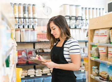 Owner checking grocery - grocery wholesaler